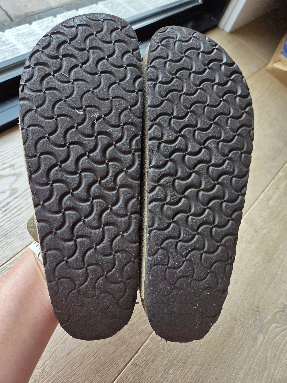 Birkenstock Boston clogs in a taupe suede